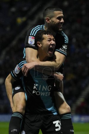 Photo for Conor Coady of Leicester City celebrates with Kasey McAteer of Leicester City scorer of a goal to make it 0-3 during the Sky Bet Championship match Preston North End vs Leicester City at Deepdale, Preston, United Kingdom, 29th April 202 - Royalty Free Image