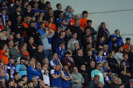 Photo for Ipswich Town fans watch on during the Sky Bet Championship match Coventry City vs Ipswich Town at Coventry Building Society Arena, Coventry, United Kingdom, 30th April 202 - Royalty Free Image