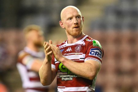 Photo for Liam Farrell of Wigan Warriors applauds to the fans at the end of the game during the Betfred Super League Round 10 match Wigan Warriors vs Catalans Dragons at DW Stadium, Wigan, United Kingdom, 2nd May 2024 - Royalty Free Image