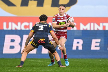 Photo for Jai Field of Wigan Warriors makes a break during the Betfred Super League Round 10 match Wigan Warriors vs Catalans Dragons at DW Stadium, Wigan, United Kingdom, 2nd May 2024 - Royalty Free Image