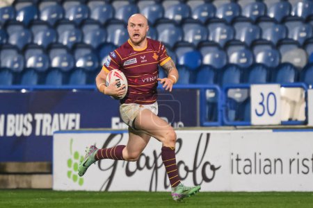 Photo for Adam Swift of Huddersfield Giants makes a break during the Betfred Super League Round 10 match Huddersfield Giants vs Salford Red Devils at John Smith's Stadium, Huddersfield, United Kingdom, 3rd May 2024 - Royalty Free Image