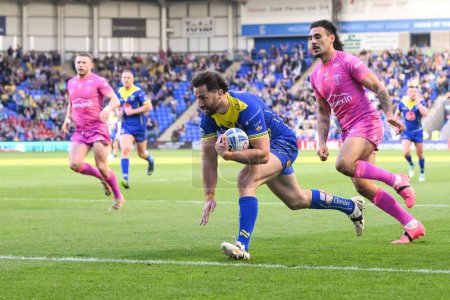 Photo for Toby King of Warrington Wolves goes over for a try during the Betfred Super League Round 11 match Warrington Wolves vs Hull KR at Halliwell Jones Stadium, Warrington, United Kingdom, 9th May 2024 - Royalty Free Image