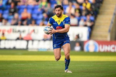 Photo for Toby King of Warrington Wolves makes a break during the Betfred Super League Round 11 match Warrington Wolves vs Hull KR at Halliwell Jones Stadium, Warrington, United Kingdom, 9th May 2024 - Royalty Free Image