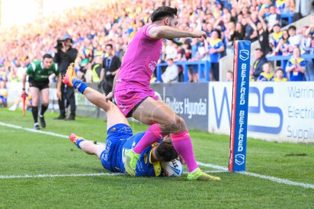 Photo for Matty Ashton of Warrington Wolves goes over for a try during the Betfred Super League Round 11 match Warrington Wolves vs Hull KR at Halliwell Jones Stadium, Warrington, United Kingdom, 9th May 2024 - Royalty Free Image