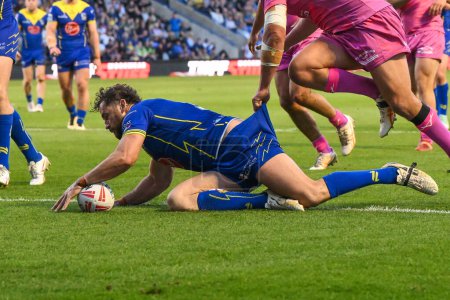 Photo for Toby King of Warrington Wolves goes over for a try during the Betfred Super League Round 11 match Warrington Wolves vs Hull KR at Halliwell Jones Stadium, Warrington, United Kingdom, 9th May 2024 - Royalty Free Image