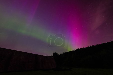 Northern Lights over Derwent Dam where Barnes Wallis Dam Busters practiced during WW2, Bamford, The Peak District National Park, United Kingdom, 10th May 2024 
