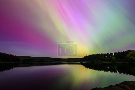 Photo for Northern Lights over Yorkshire at Langsett Reservoir, Barnsley, United Kingdom, 10th May 2024 - Royalty Free Image