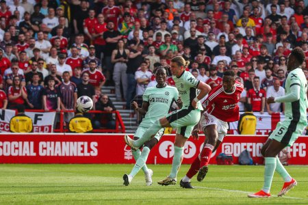 Photo for Willy Boly of Nottingham Forest scores a goal to make it 1-1 during the Premier League match Nottingham Forest vs Chelsea at City Ground, Nottingham, United Kingdom, 11th May 2024 - Royalty Free Image