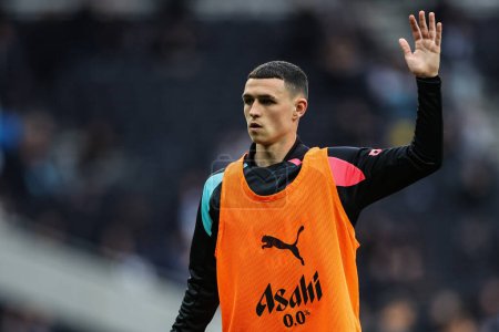 Photo for Phil Foden of Manchester City during the pre-game warm up ahead of the Premier League match Tottenham Hotspur vs Manchester City at Tottenham Hotspur Stadium, London, United Kingdom, 14th May 2024 - Royalty Free Image