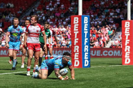 Photo for Tyler Dupree of Wigan Warriors goes over for a try during the Betfred Challenge Cup Semi-Final Hull KR v Wigan Warriors at Eco-Power Stadium, Doncaster, United Kingdom, 18th May 2024 - Royalty Free Image
