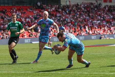 Photo for Harry Smith of Wigan Warriors goes over for a try during the Betfred Challenge Cup Semi-Final Hull KR v Wigan Warriors at Eco-Power Stadium, Doncaster, United Kingdom, 18th May 2024 - Royalty Free Image