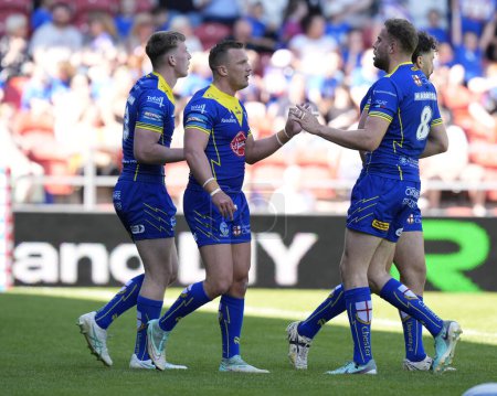Photo for James Harrison celebrates with Josh Drinkwater of Warrington Wolves after he scores a try during the Betfred Challenge Cup Semi-Final match Huddersfield Giants vs Warrington Wolves at Totally Wicked Stadium, St Helens, United Kingdom, 19th May 2024 - Royalty Free Image