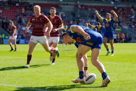 Photo for Matt Dufty of Warrington Wolves touches down to score a try during the Betfred Challenge Cup Semi-Final match Huddersfield Giants vs Warrington Wolves at Totally Wicked Stadium, St Helens, United Kingdom, 19th May 2024 - Royalty Free Image