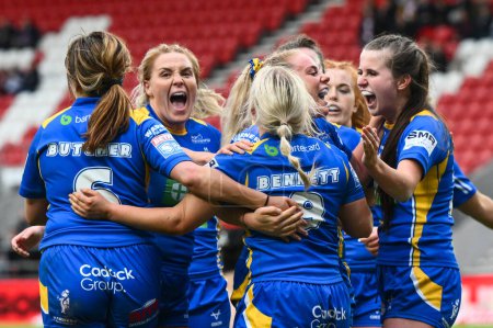Photo for Keara Bennett of Leeds Rhinos celebrates her try during the Betfred Women's Super League match St Helens vs Leeds Rhinos at Totally Wicked Stadium, St Helens, United Kingdom, 24th May 2024 - Royalty Free Image