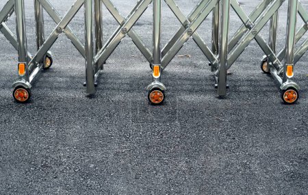 Photo for Close-up a metal wheel door entrance on asphalt floor. - Royalty Free Image