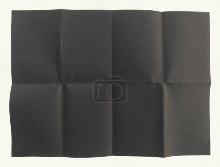 Photo for Close up of black paper folded in eight, texture background - Royalty Free Image