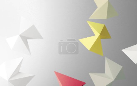 Foto de Formas coloridas hechas de papel aislado en gris - Imagen libre de derechos