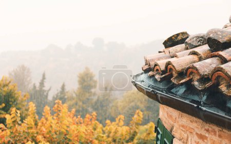 Photo for Old roof detail, view from the window in rainy day - Royalty Free Image