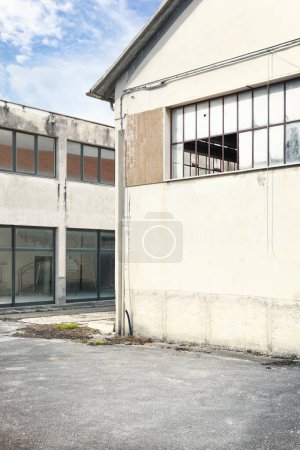 Photo for Abandoned warehouse, cement construction - Royalty Free Image