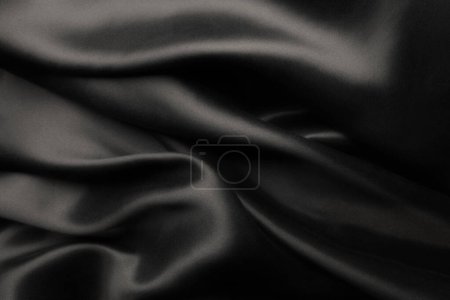 Photo for Elegant black satin silk with waves, abstract background - Royalty Free Image