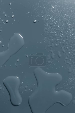 Foto de Superficie con gotas de agua, fondo azul - Imagen libre de derechos
