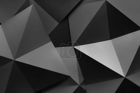 Foto de Imagen macro de formas piramidales negras, patrón abstracto, ilustración 3d - Imagen libre de derechos
