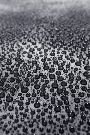 Foto de Gotas de agua sobre una superficie rugosa, fondo de textura - Imagen libre de derechos