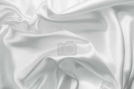 Foto de Elegante seda satinada blanca con ondas, fondo abstracto - Imagen libre de derechos