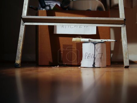 Photo for Redecorating kitchen with paint and stepladders medium shot selective focus - Royalty Free Image