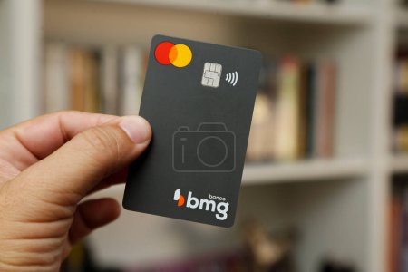 Foto de Minas Gerais, Brasil - 22 de marzo de 2023: BMG bank Mastercard logo credit card,, illustrative editorial image. - Imagen libre de derechos