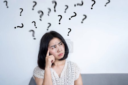 Asian woman age 40 having problem with memory loss, forgetful, alzheimer concept 