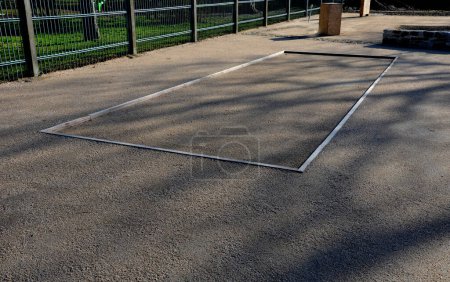 Photo for It is recommended to demarcate the playground behind the area of loss with wooden barriers, telegraph poles, sleepers, wooden barriers are better than concrete ones. Better cushions ball impacts. - Royalty Free Image