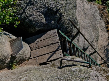Photo for Rock viewpoints and outdoor ladders are maintained by voluntary associations. they check the condition and attachment of elements in the rock. use extra caution - Royalty Free Image
