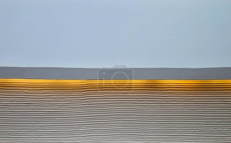Photo for Soffit with a cornice illuminated by LED strips in the arch. walls lined with brown wooden plywood. light cones make a festive impression. a night club with a great reputation and atmosphere, hall - Royalty Free Image