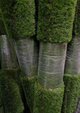 Artificial turf is a surface of synthetic fibers made to look like natural grass, used in sports arenas, residential lawns and commercial applications