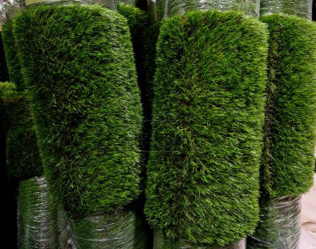 Artificial turf is a surface of synthetic fibers made to look like natural grass, used in sports arenas, residential lawns and commercial applications