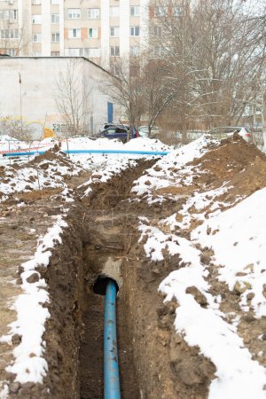 Photo for Tiraspol, Moldova - December 9, 2023: Plumbing pipe laying. Plastic polypropylene pipe. Sanitary, sewer drainage system for a multi-story building. Selective focus, shallow depth of field - Royalty Free Image