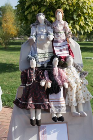 Tilda rag dolls, handmade. Handmade crafts at the exhibition of folk art