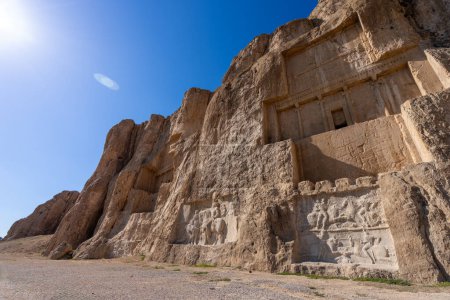 Majestic tombs of Persian kings carved into the hard rock. These ancient tombs are a testament to the grandeur of the Persian Empire, Naqsh-Rostam, Iran.