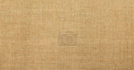 Foto de Lienzo textil texturizado de tela de lino sin procesar - Imagen libre de derechos