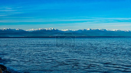 A view of the Olympic Mountain Range from Oak Harbor, Washington.