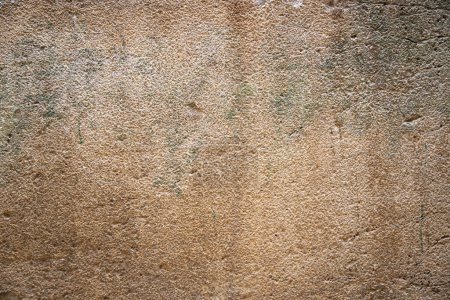 Foto de Textura de una antigua losa de piedra en la pared de la Cueva de los Patriarcas en el corazón de la Ciudad Vieja de Hebrón en Cisjordania. - Imagen libre de derechos