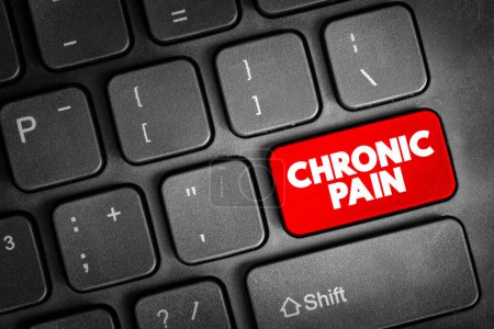 Foto de Botón de texto de dolor crónico en el teclado, fondo conceptual - Imagen libre de derechos