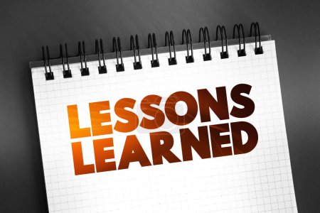 Lessons Learned text quote on notepad, concept background