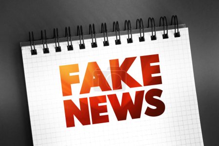 Photo for Fake News text on notepad, concept background - Royalty Free Image
