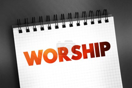 Worship - act of religious devotion usually directed towards a deity, text concept on notepad