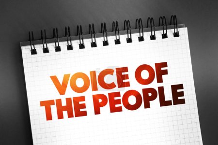 Foto de Voz del pueblo - significa la opinión de la mayoría de la gente, texto en bloc de notas, fondo conceptual - Imagen libre de derechos