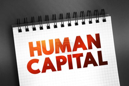 Photo for Human Capital - economic value of a worker's experience and skills, text concept on notepad - Royalty Free Image