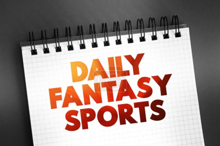 Photo for Daily Fantasy Sports text on notepad, concept background - Royalty Free Image