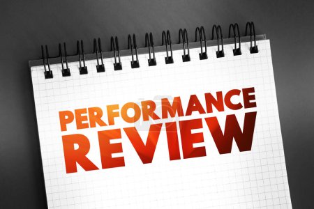 Photo for Performance Review - formal assessment in which a manager evaluates an employee's work performance, text concept on notepad - Royalty Free Image